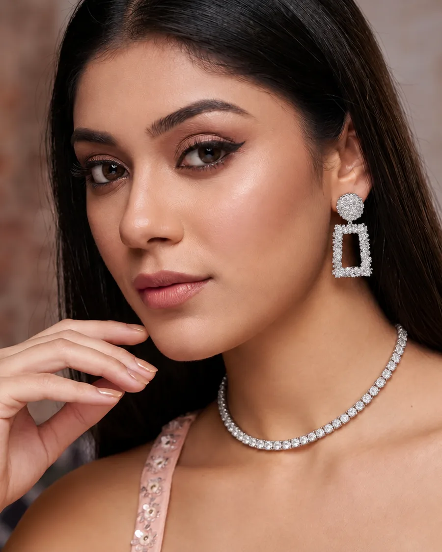 April 2027: Aerial Silver hammered geometric earrings look