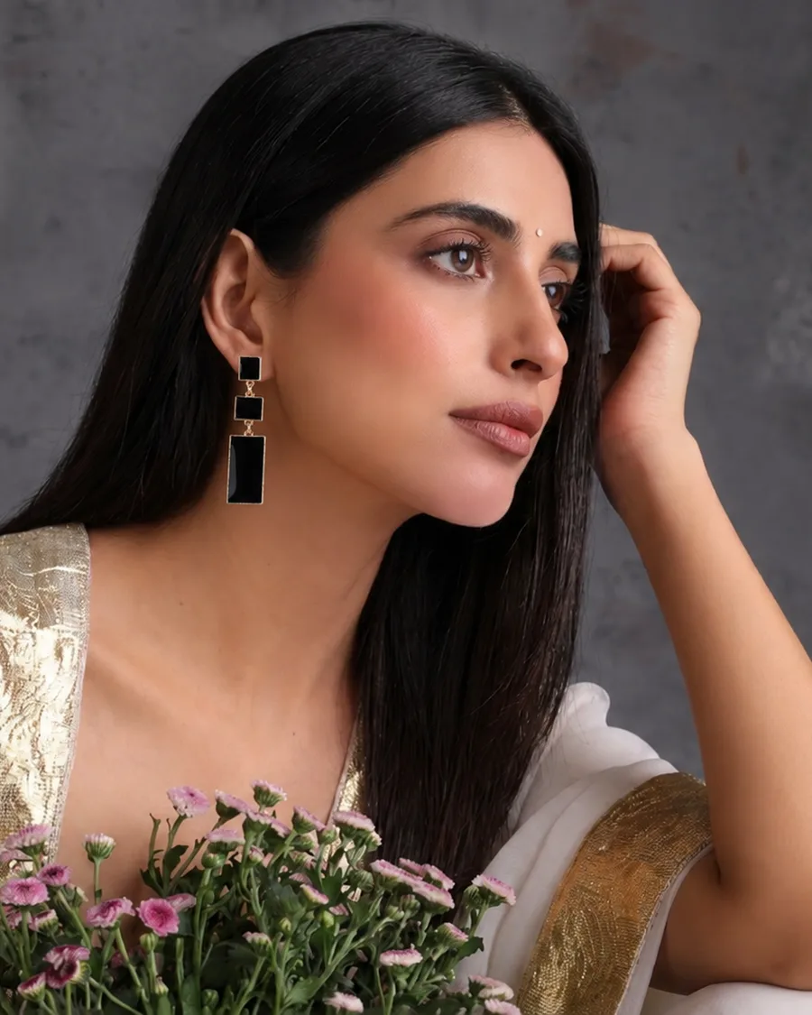 July 2027: Sarina Black dramatic teardrop earrings look