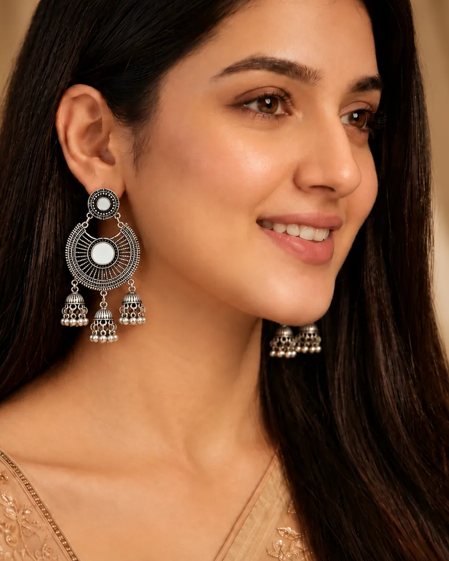 November 2027: Devika Tribal Mirror oxidised silver statement look