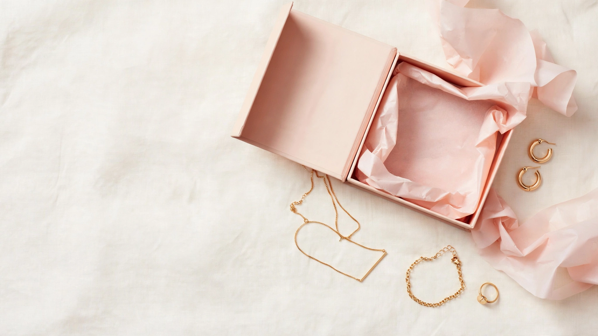 The Swag World signature keepsake jewellery box with curated necklace, bracelet, earrings and ring