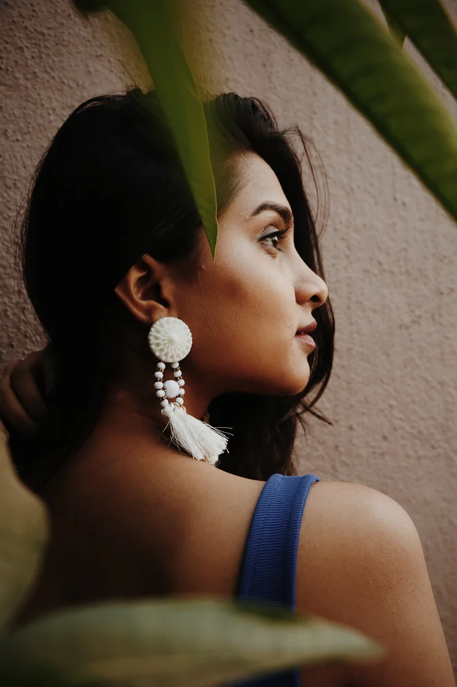 Real customer styling featuring off-shoulder top and drop earrings
